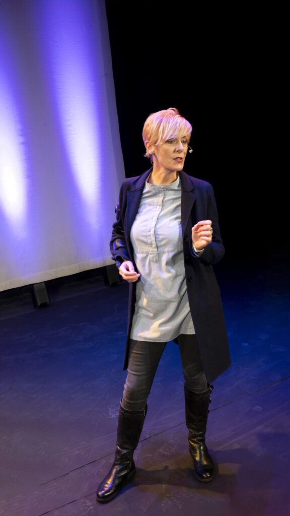 Photo of Charlotte on stage