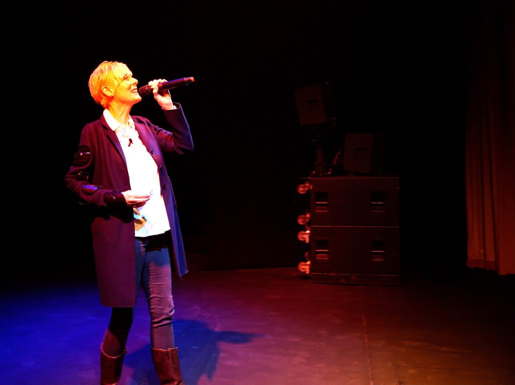 Photo of Charlotte on stage